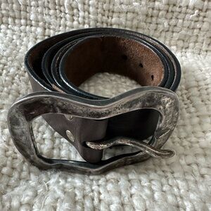 Elegant Dark Brown Leather Belt with Distinctive Silver Buckle